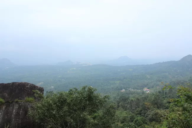 Photo of Edakkal Caves, Nenmeni, Kerala, India by Vrinda