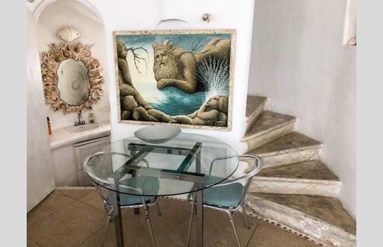 Photo of Channel Your Inner Mermaid with a Staycation at This Shell-House Airbnb. by Palak Doshi