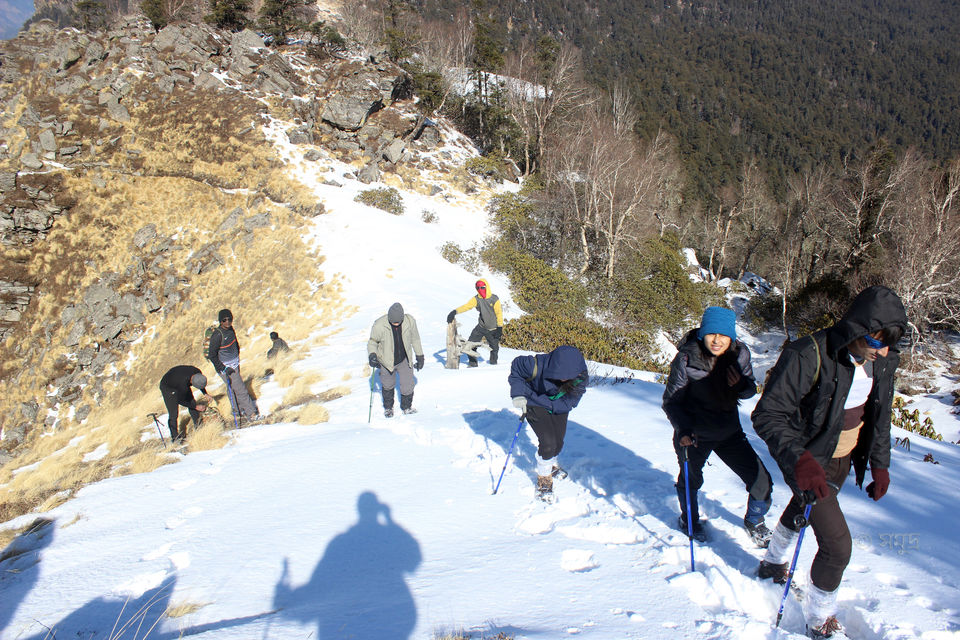 Photo of The warmth of friendship on the snow clad slopes of Kuari Pass by Samudra Sengupta