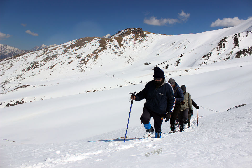 Photo of The warmth of friendship on the snow clad slopes of Kuari Pass by Samudra Sengupta