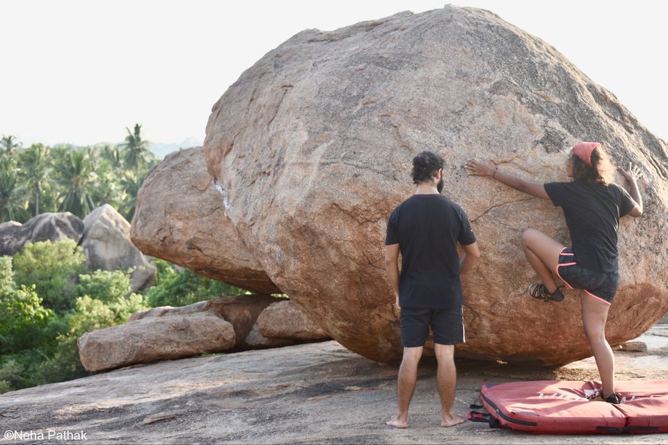 Photo of Bare hands on boulders (Hippie Island, Hampi) by Neha Pathak