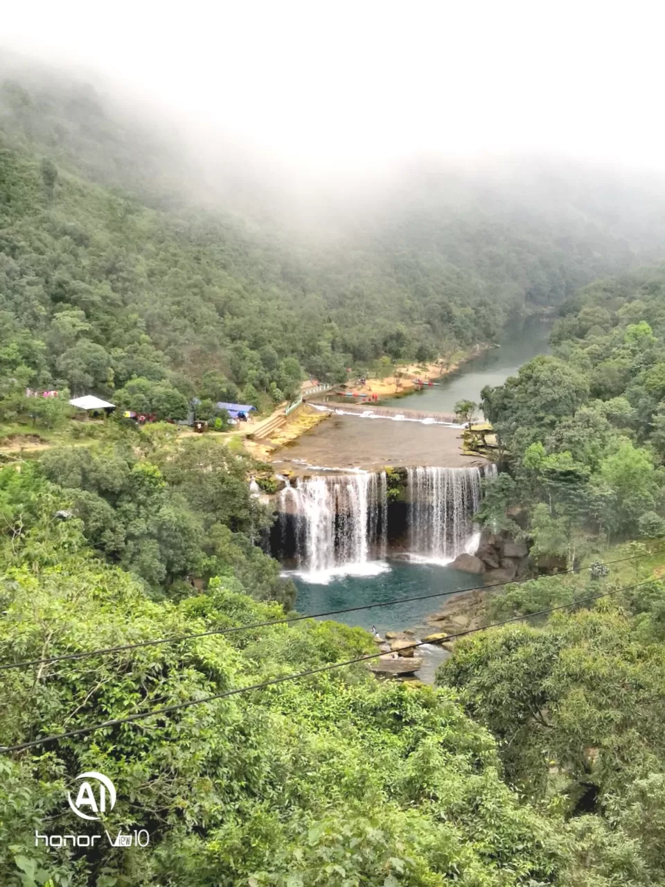 Photo of Krang Shuri Waterfall, Meghalaya, India by Surela Ganguly