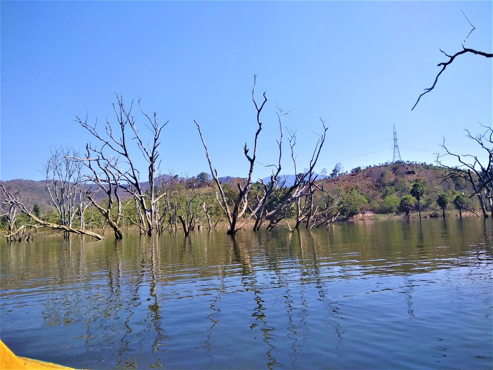 Photo of Boating on a lake water between the dead trees in Andhra Pradesh! by Hemanth Bhargav Murthy (Hemuu)