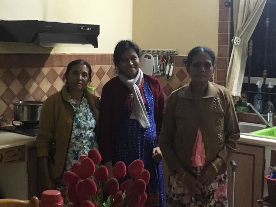 Photo of Breaking Bread with Kaviraj's Family by Anuj Tikku