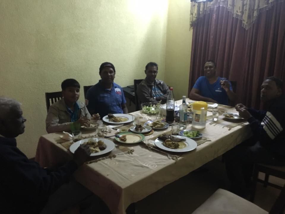Photo of Breaking Bread with Kaviraj's Family by Anuj Tikku
