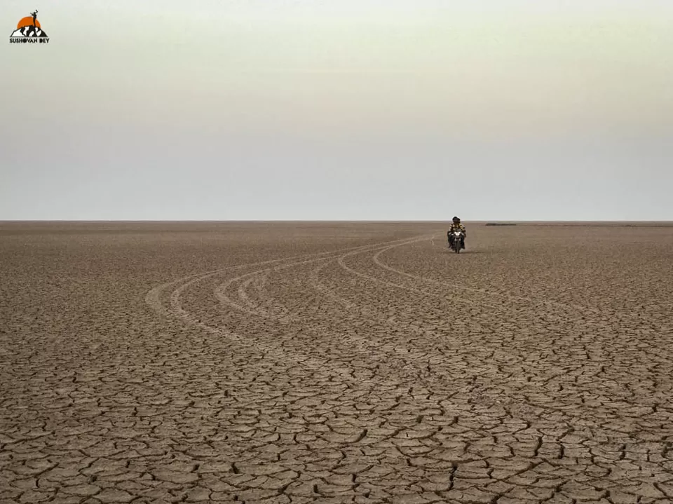 Photo of Two honeymooners and one bike in Kutch by JourneyJournals