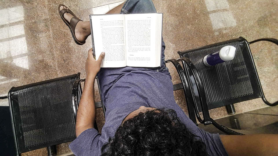 Photo of Walking around Malgudi, with a book and water-bottle in hand 2/65 by Taushik Mandal