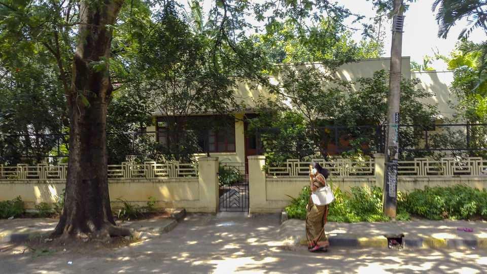 Photo of Walking around Malgudi, with a book and water-bottle in hand 8/65 by Taushik Mandal