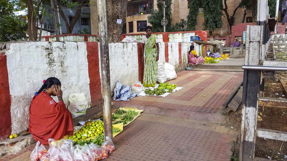 Photo of Walking around Malgudi, with a book and water-bottle in hand 19/65 by Taushik Mandal