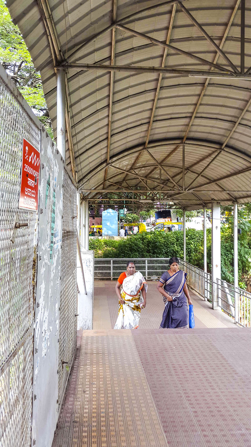 Photo of Walking around Malgudi, with a book and water-bottle in hand 23/65 by Taushik Mandal