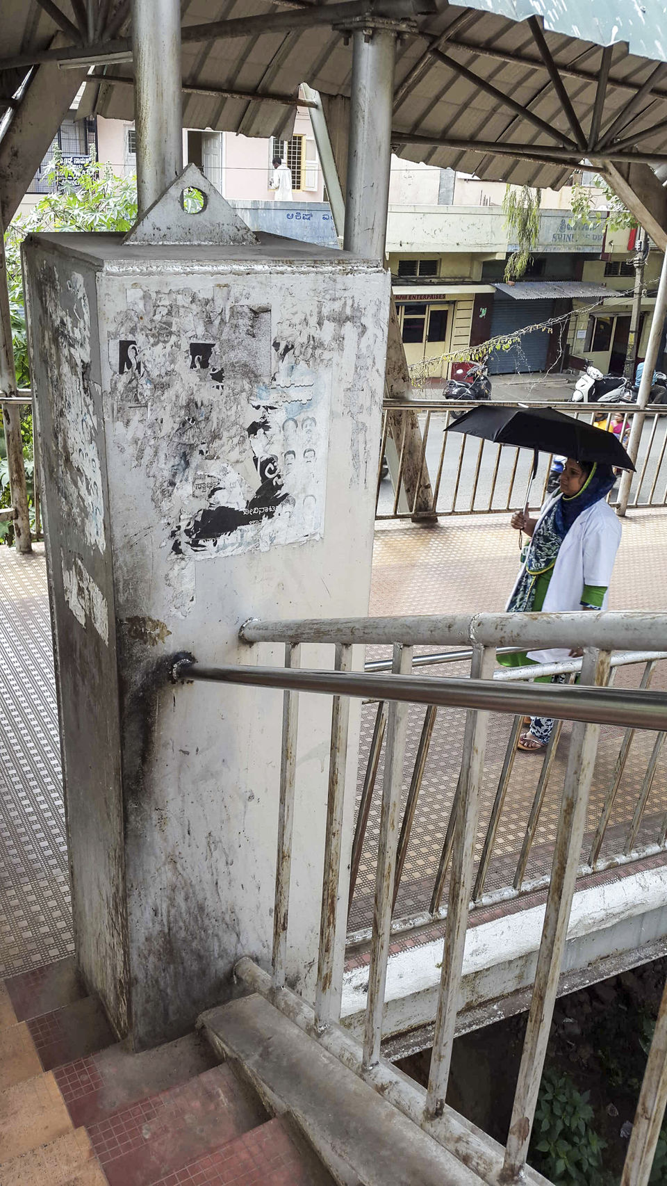Photo of Walking around Malgudi, with a book and water-bottle in hand 24/65 by Taushik Mandal