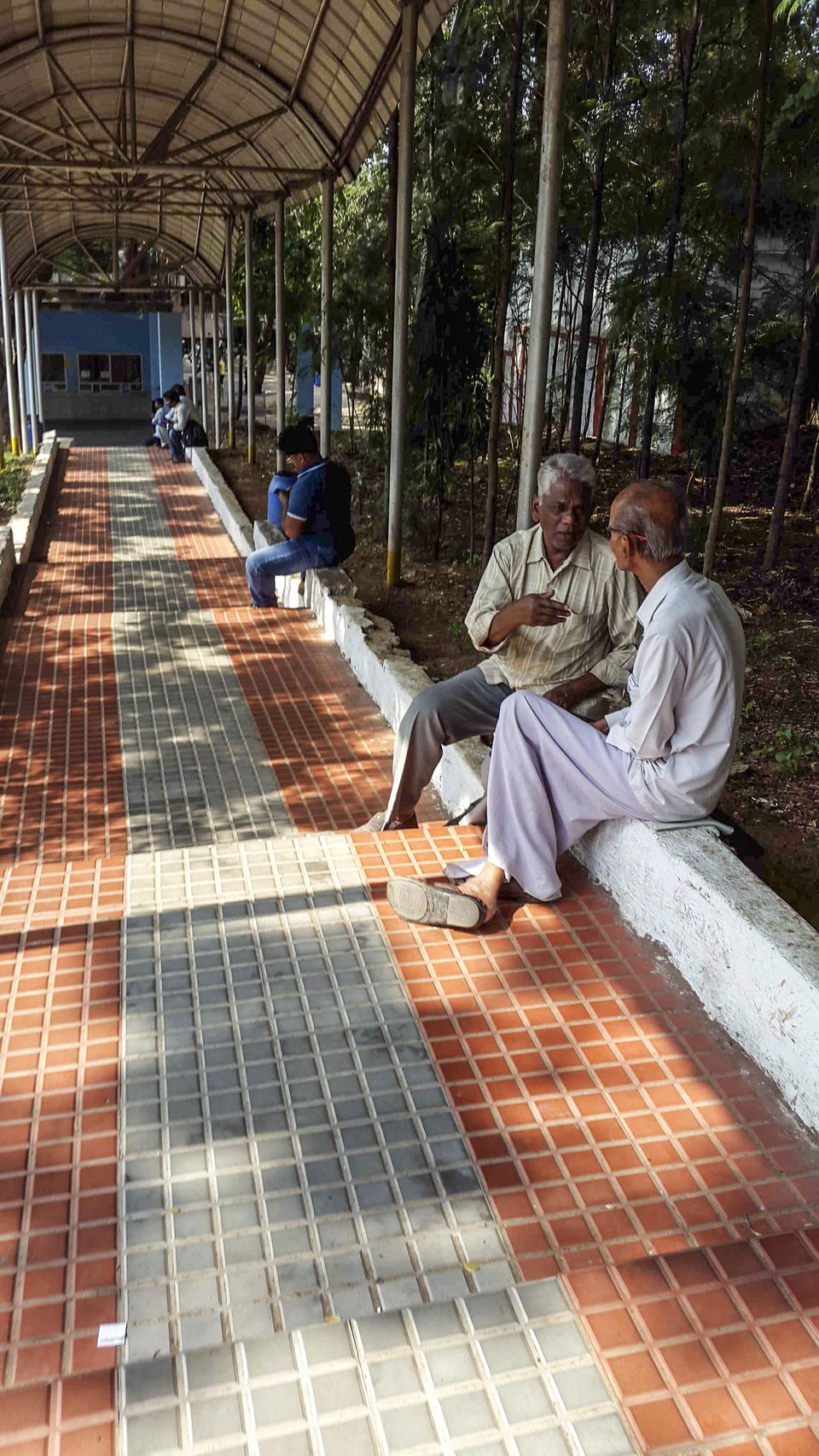 Photo of Walking around Malgudi, with a book and water-bottle in hand 29/65 by Taushik Mandal