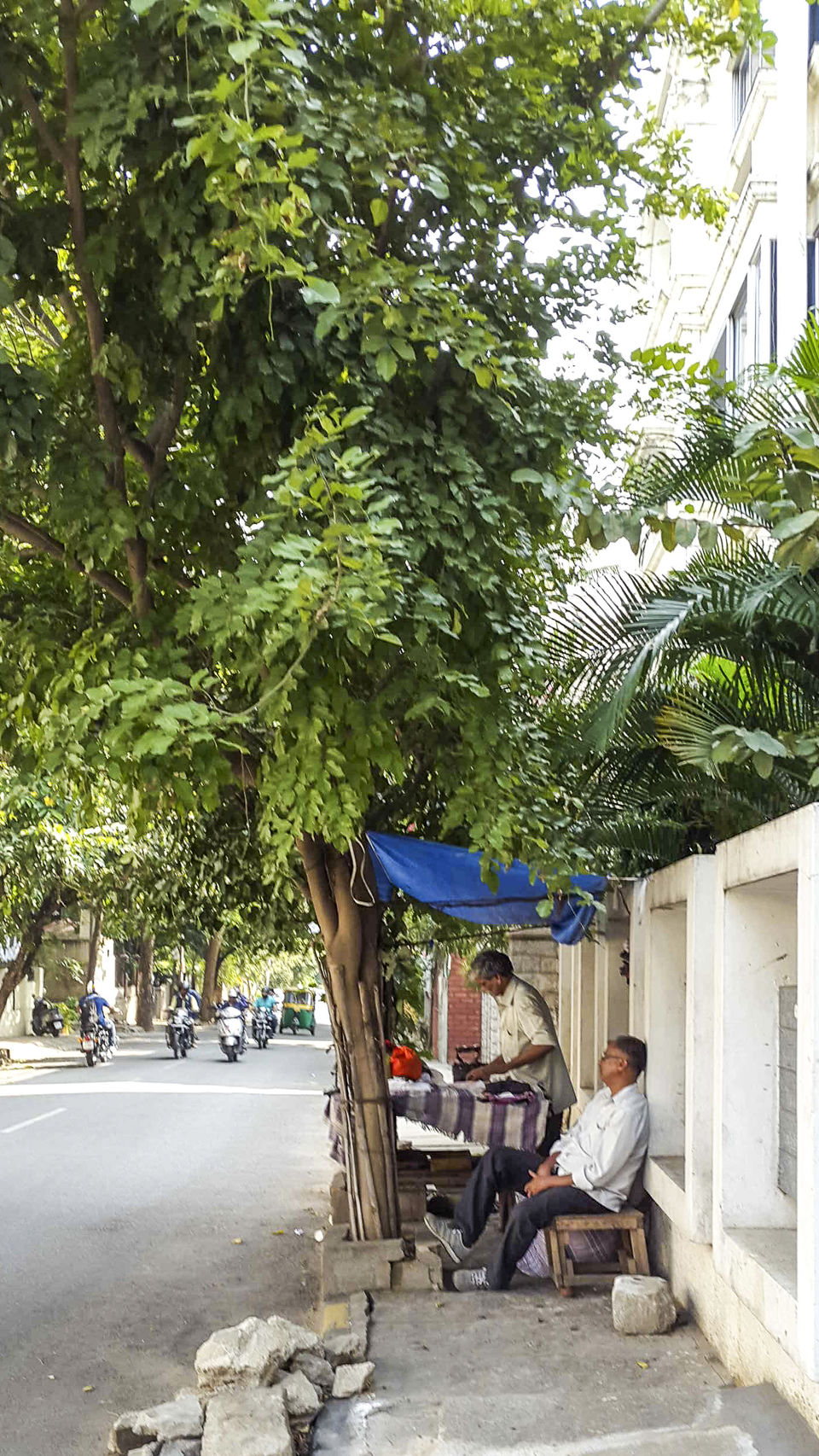Photo of Walking around Malgudi, with a book and water-bottle in hand 47/65 by Taushik Mandal