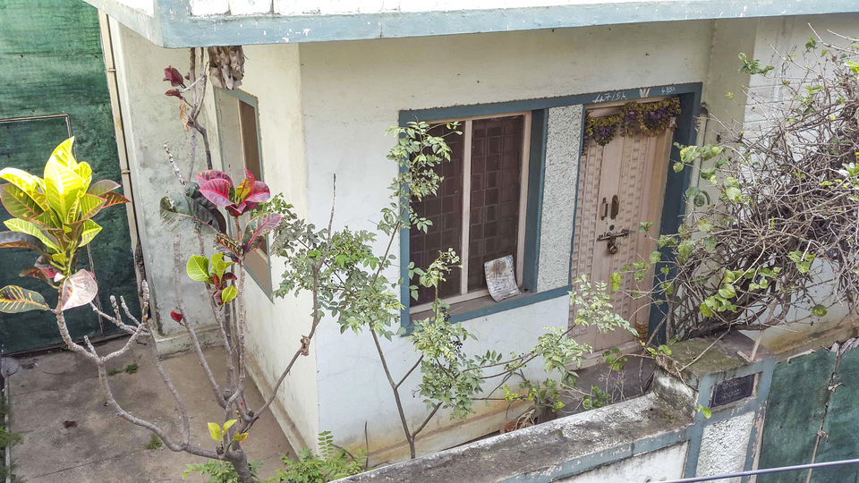 Photo of Walking around Malgudi, with a book and water-bottle in hand 50/65 by Taushik Mandal
