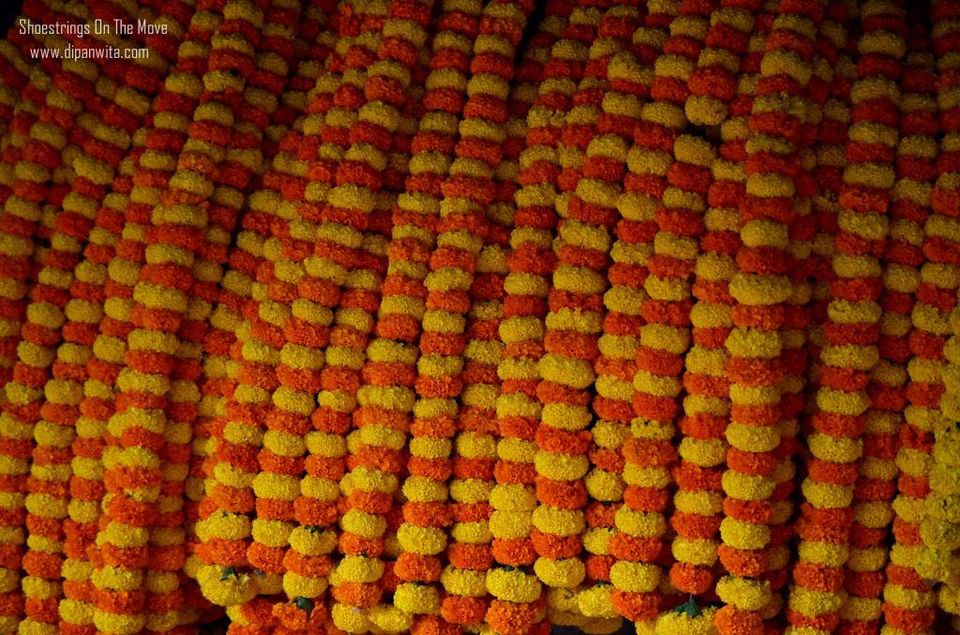 Photo of Mallik Ghat Flower Market- A Riot Of Colors Under Howrah Bridge 2/21 by Dipanwita Chakraborty
