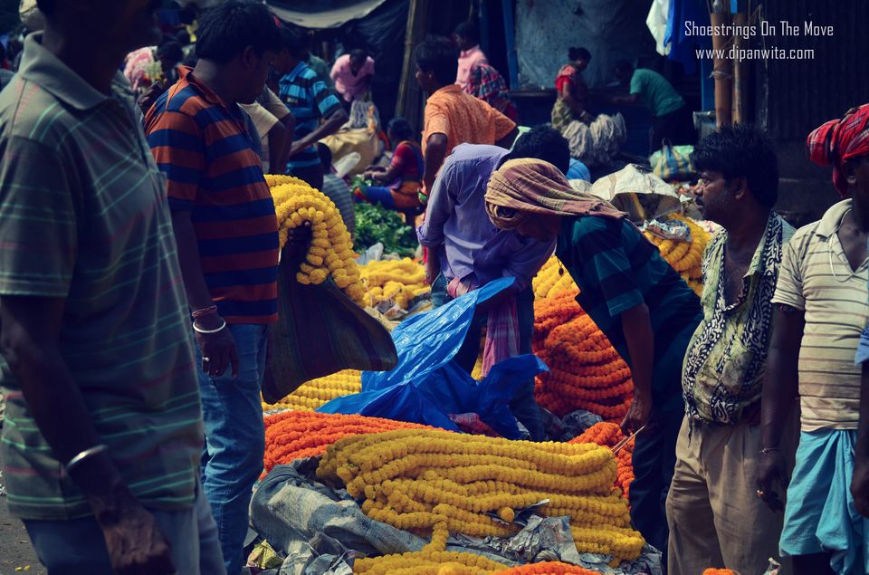 Photo of Mallik Ghat Flower Market- A Riot Of Colors Under Howrah Bridge 13/21 by Dipanwita Chakraborty