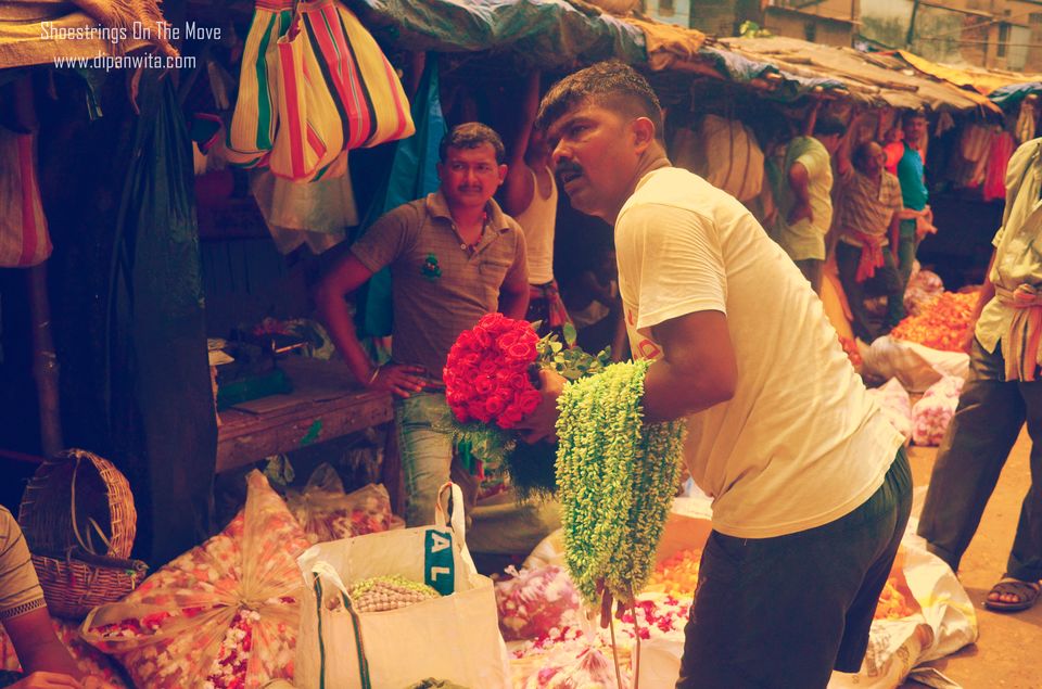 Photo of Mallik Ghat Flower Market- A Riot Of Colors Under Howrah Bridge 15/21 by Dipanwita Chakraborty