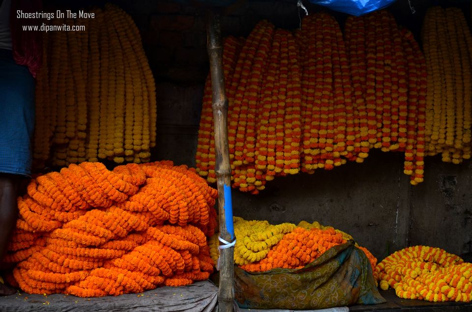 Photo of Mallik Ghat Flower Market- A Riot Of Colors Under Howrah Bridge 19/21 by Dipanwita Chakraborty