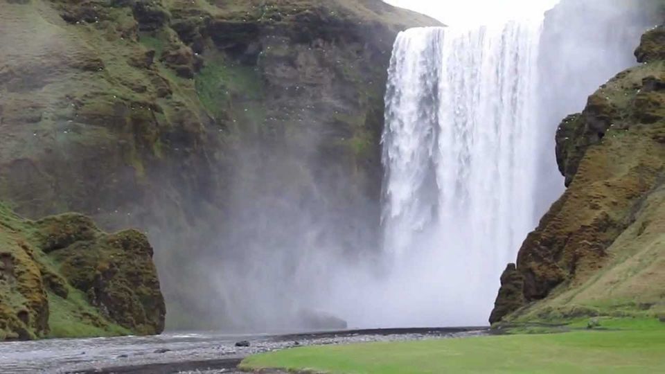 Photo of Skogafoss - Rainbow lits up the Fall in Summers 3/5 by Aanchal Karnwal