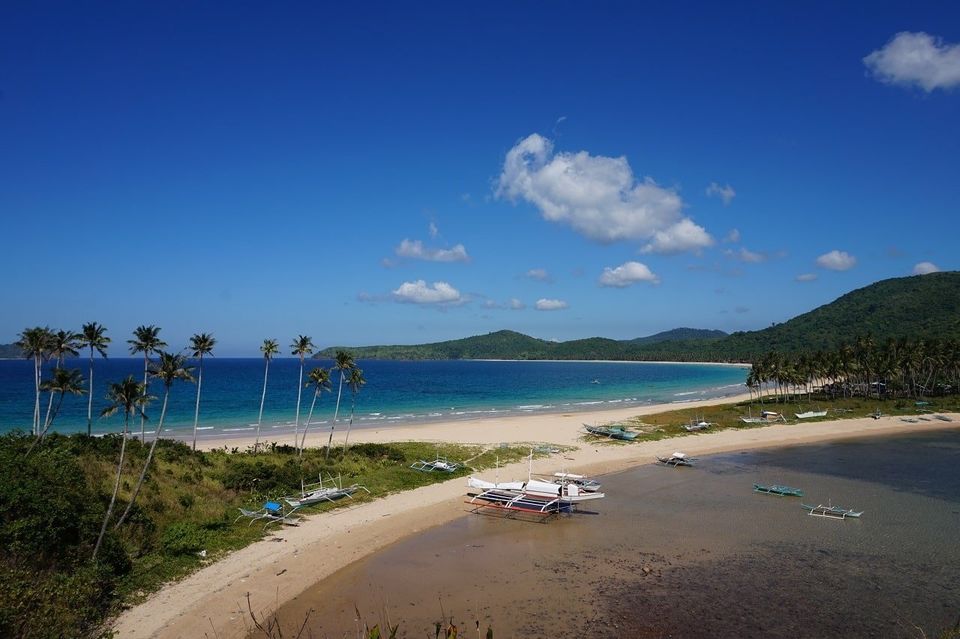 Photo of El Nido's Finest: Beautiful Nacpan Beach in Palawan by Julian Schoenfelder