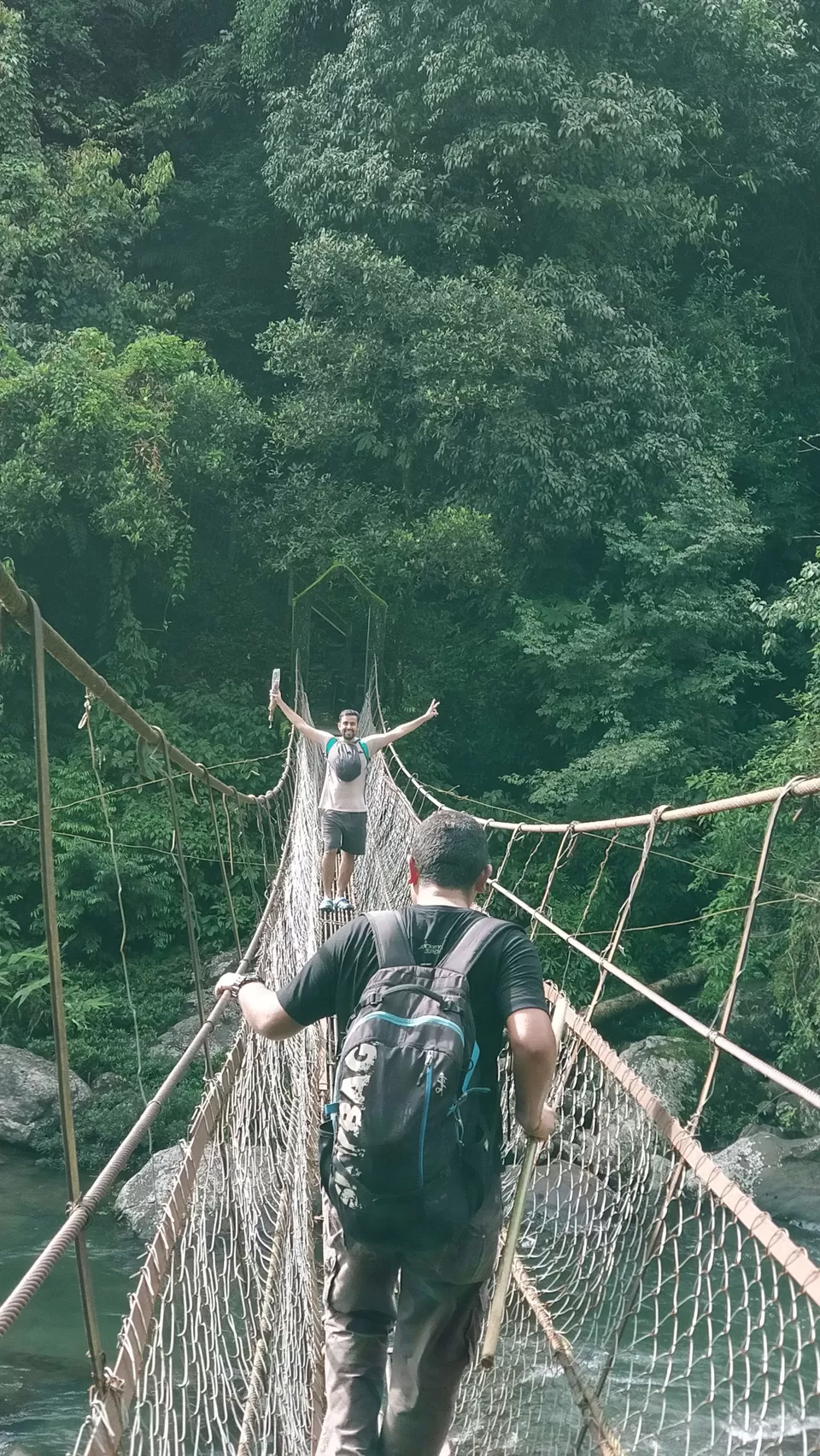 Photo of Nongriat Iron Rod Hanging Bridge, Nongriat, Meghalaya, India by baniya travellers
