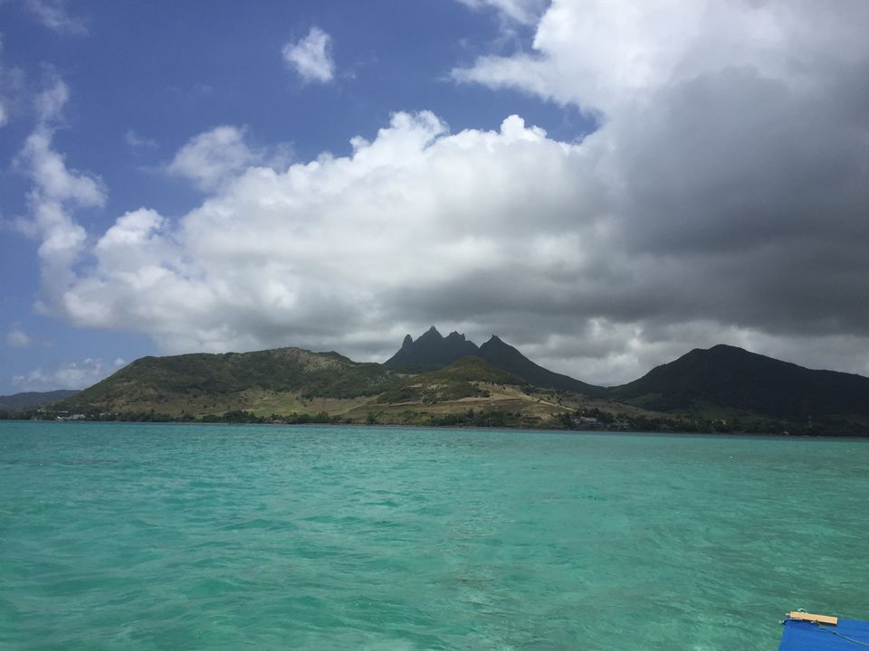 Photo of The turquoise blue waters of Mauritius and the view from Ile Aux Cerf by Mohil Poojara