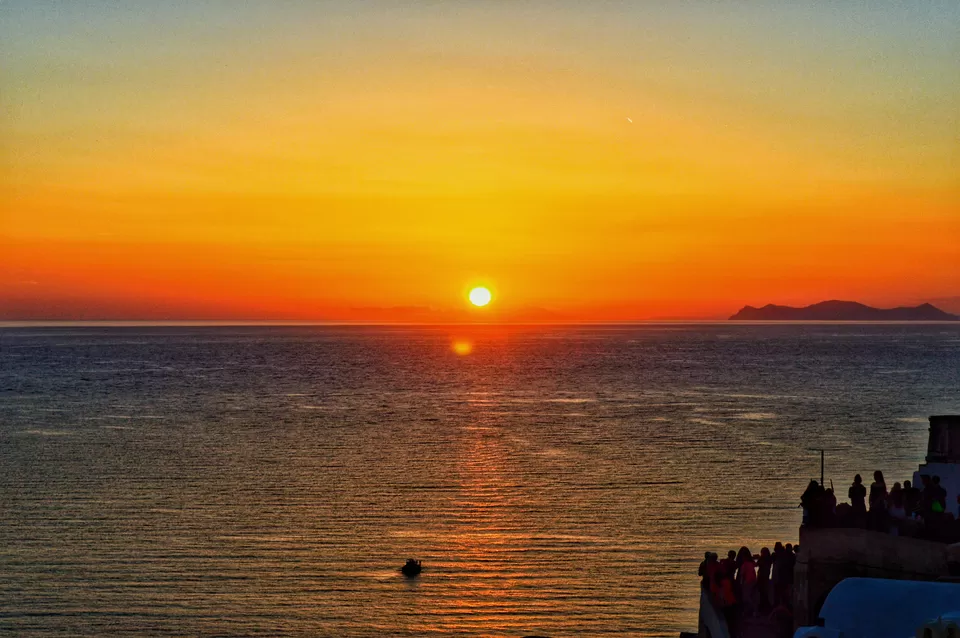 Photo of Oia's Sunset, Oia, Greece by Vacay Couple