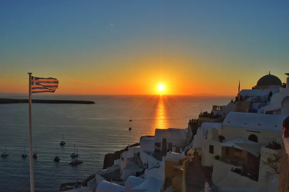 Photo of Oia's Sunset, Oia, Greece by Vacay Couple