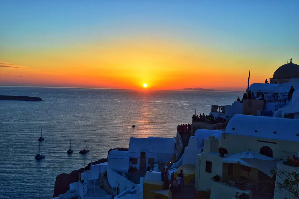 Photo of Oia's Sunset, Oia, Greece by Vacay Couple
