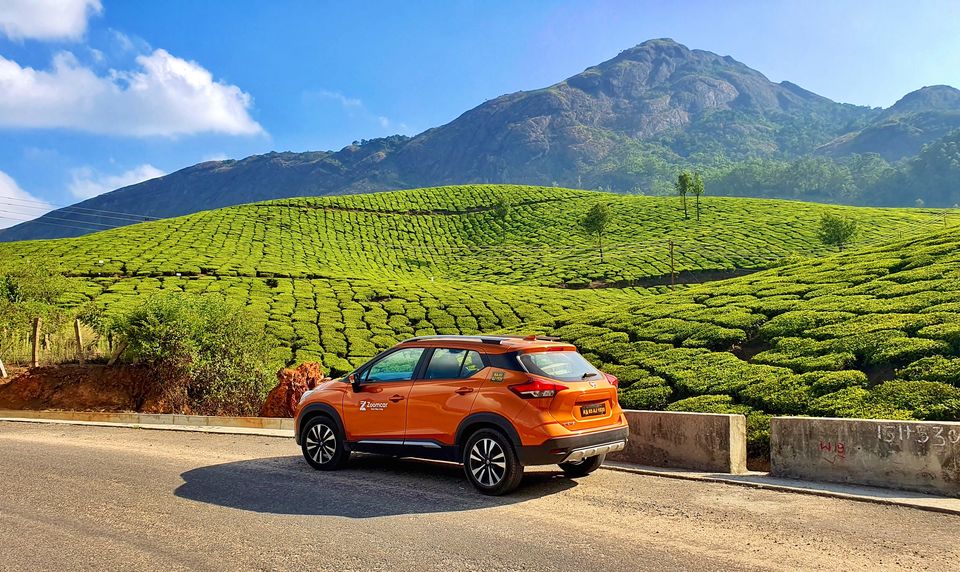 Photo of Kolukkumalai Tea Plantation, Moolakadai, Munnar, Kerala, India by Vacay Couple