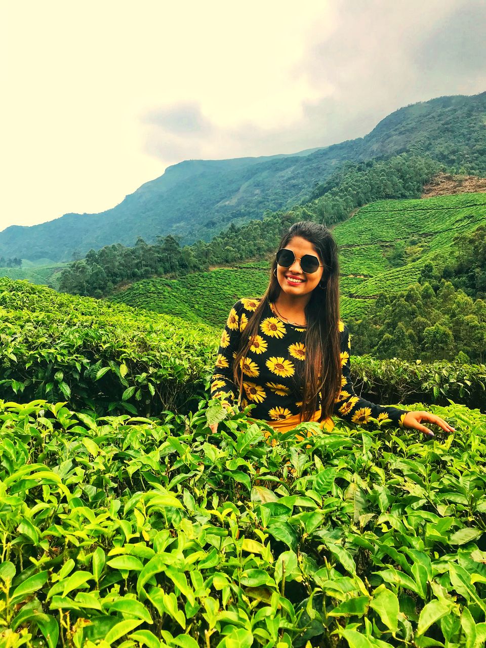 Photo of Kolukkumalai Tea Plantation, Moolakadai, Munnar, Kerala, India by Vacay Couple