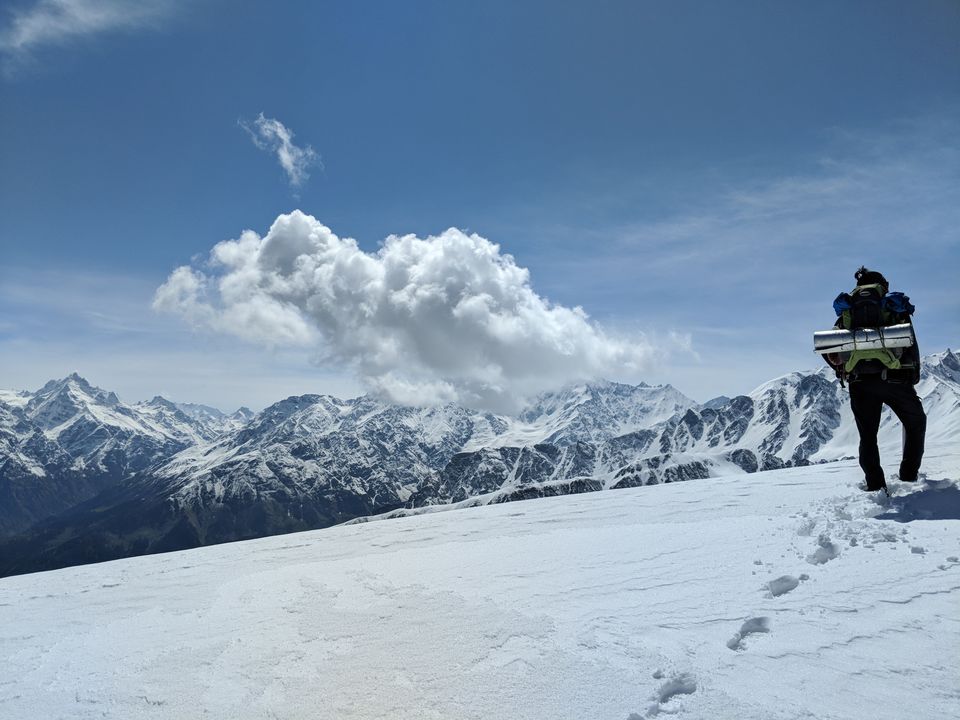Photo of Sar Pass - A frozen lake, a ridge and snow slides at 14k feet by Mouna Nanaiah