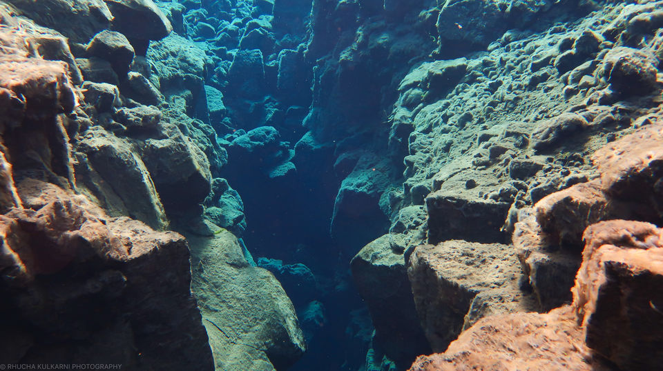 Photo of Snorkelling Between Two Slices of the Earth : Silfra in Iceland 2/5 by Rhucha Kulkarni