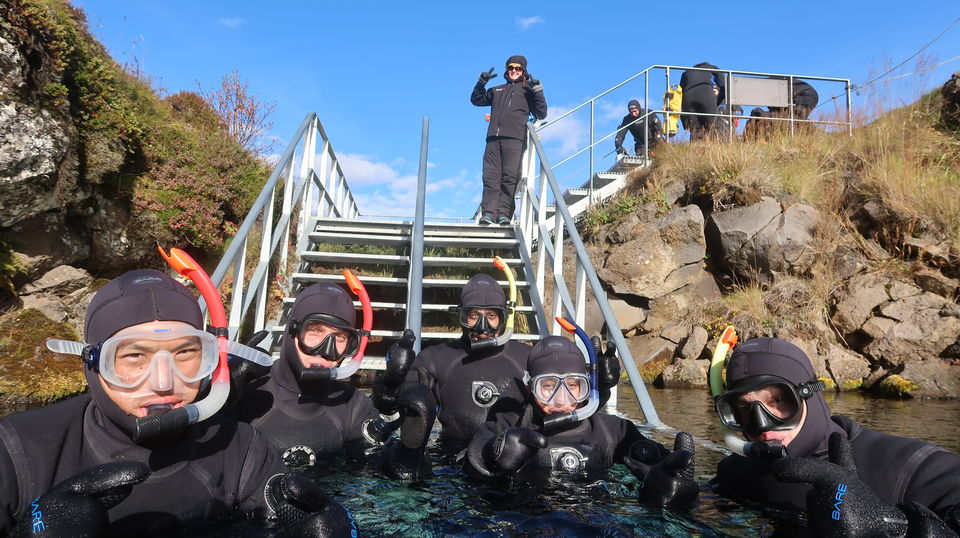 Photo of Snorkelling Between Two Slices of the Earth : Silfra in Iceland 3/5 by Rhucha Kulkarni