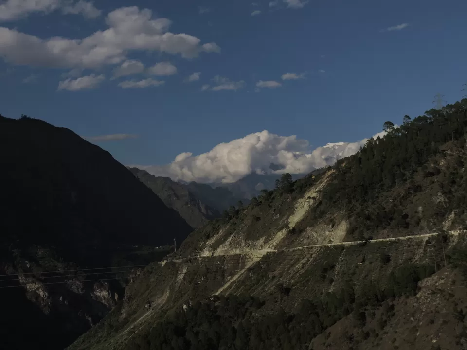 Photo of Sun rays illuminating mountains as per it's whim by Saumil Sah