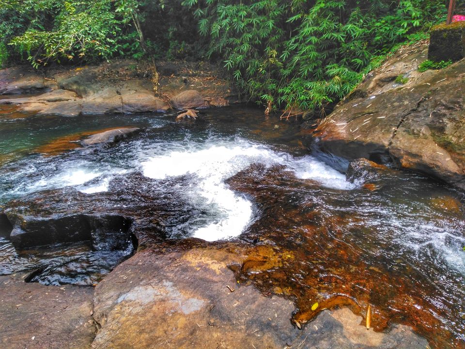 Photo of Anchukuzhy - A temple guarded by a roaring waterfall by Thejus R