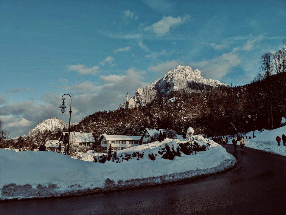 Photo of Dreamy Castle in Snow- Neuschwanstein by Woolgathering Wonders