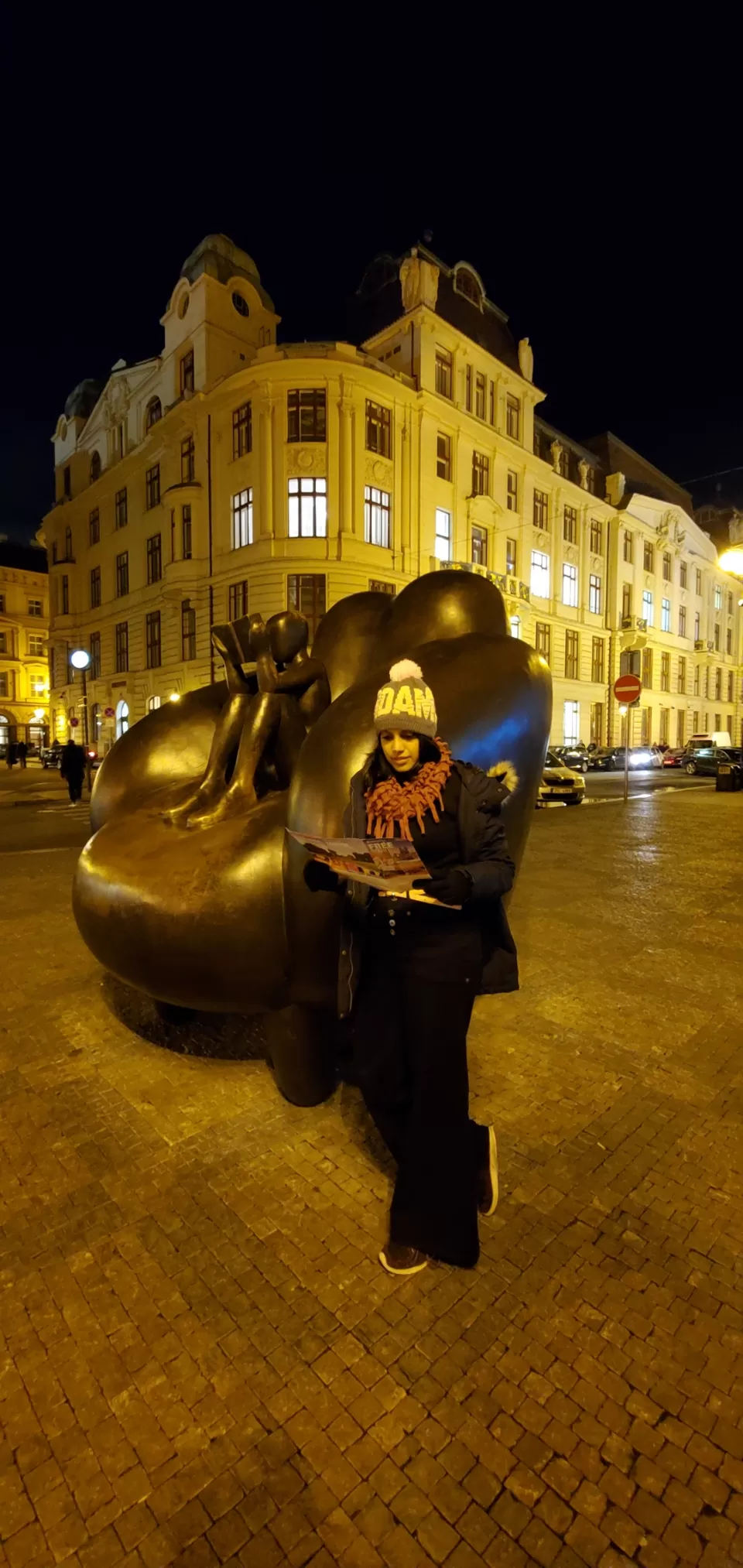 Photo of Reader in an Armchair by Jaroslav Róna, Salvátorská, Old Town, Czechia by Swati Goyal
