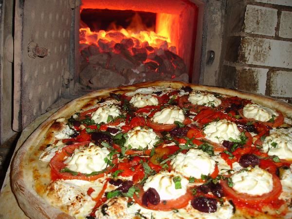 Photo of Lombardi's Pizza, Spring Street, New York, NY, United States by Megan Eileen