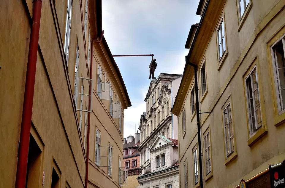 Photo of Man Hanging Out, Husova, Old Town, Czechia by Bibek Chaudhuri