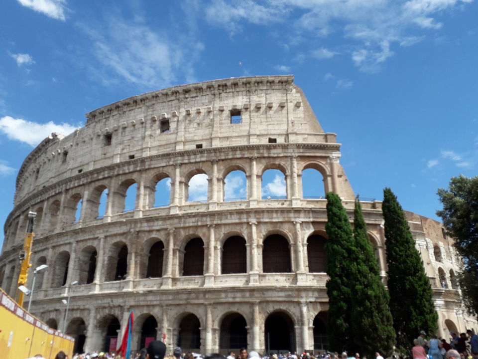 Photo of Colosseum, Piazza del Colosseo, Rome, Metropolitan City of Rome, Italy by Priya Saxena