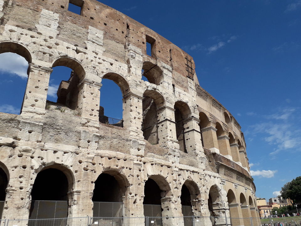 Photo of Colosseum, Piazza del Colosseo, Rome, Metropolitan City of Rome, Italy by Priya Saxena