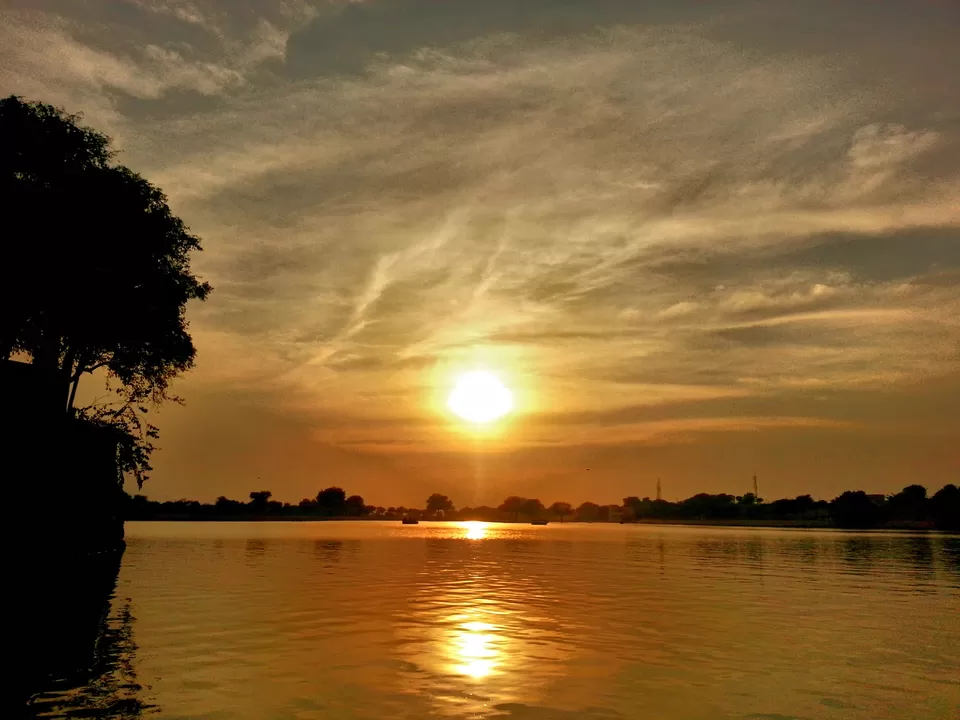 Photo of Sunset By The Heritage Lake by Rashmi Prasanna