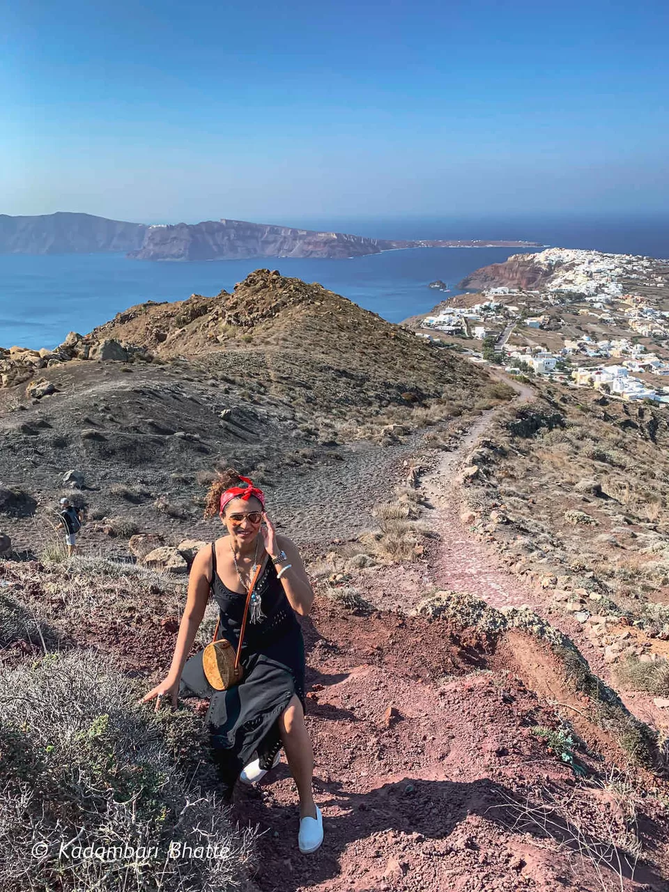 Photo of Fira, Greece by Kadambari Bhatte (curlytravelmess)