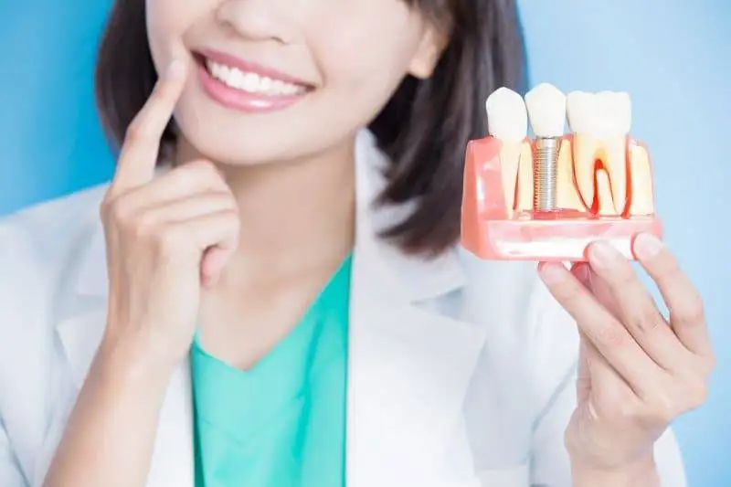 Photo of Why Choose Dental Implants Over Dentures? by Dynamic Clinic