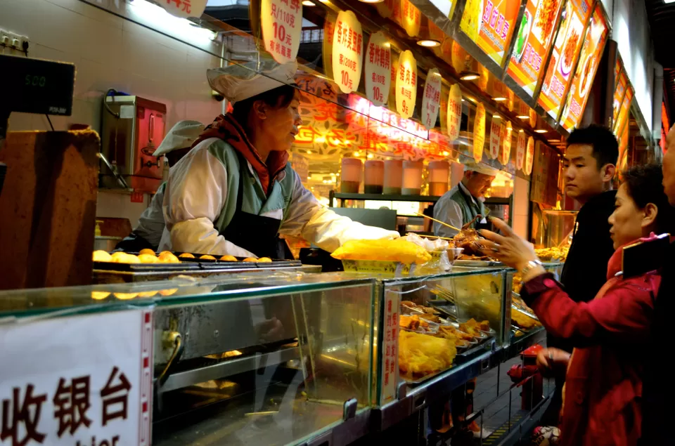Photo of Nanjing Lu, Nanjing Road Pedestrian Street, Huangpu, Shanghai, China by Aditi Jana