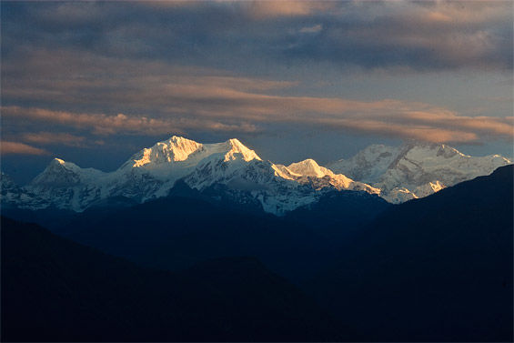 Photo of Mighty Kangchenjunga under Midnight Moon by Ankita Karmakar