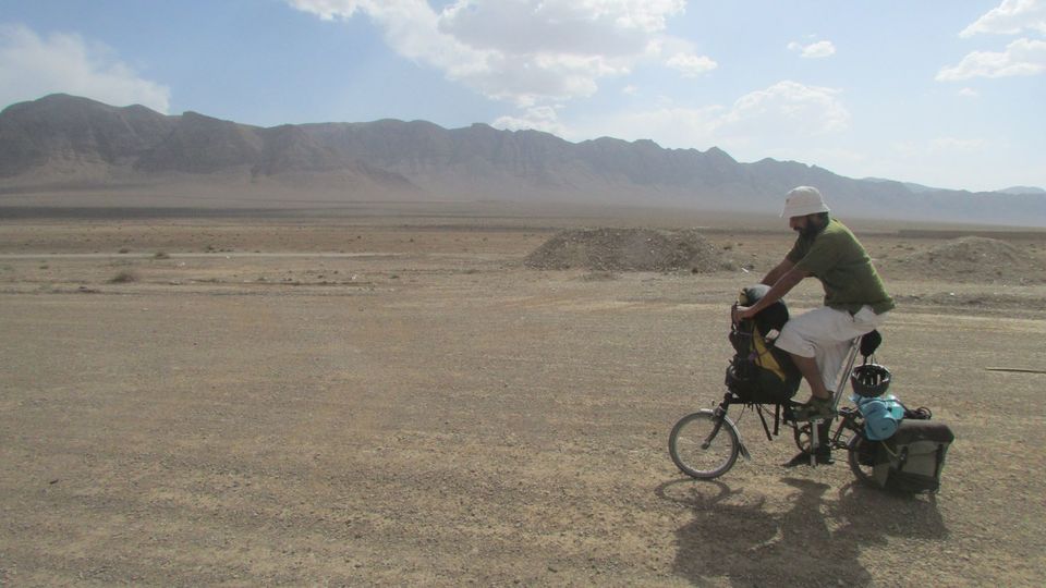 Photo of Round the World on a Folding Bike with $5 a day by Indo-Japanese couple 5/13 by Sunil Kumar V Kaushik