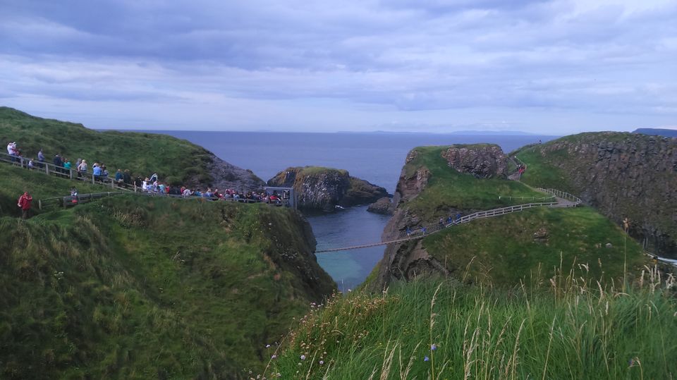 Photo of Carrick-A-Rede Rope Bridge, Ballycastle, United Kingdom by Pooja