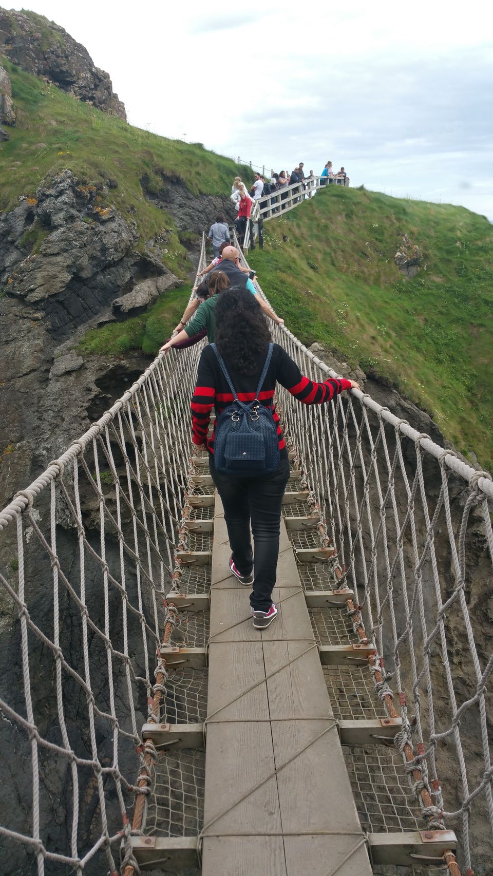 Photo of Carrick-A-Rede Rope Bridge, Ballycastle, United Kingdom by Pooja